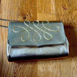 Vintage HL gold handbag. Small. Some signs of wear because its….well, vintage.